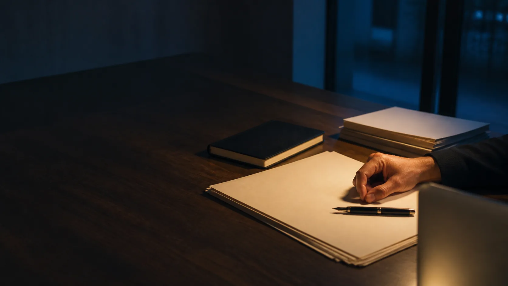 Illustrative editorial scene of a quiet working table prepared for review.